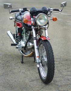 front of a red motorcycle
